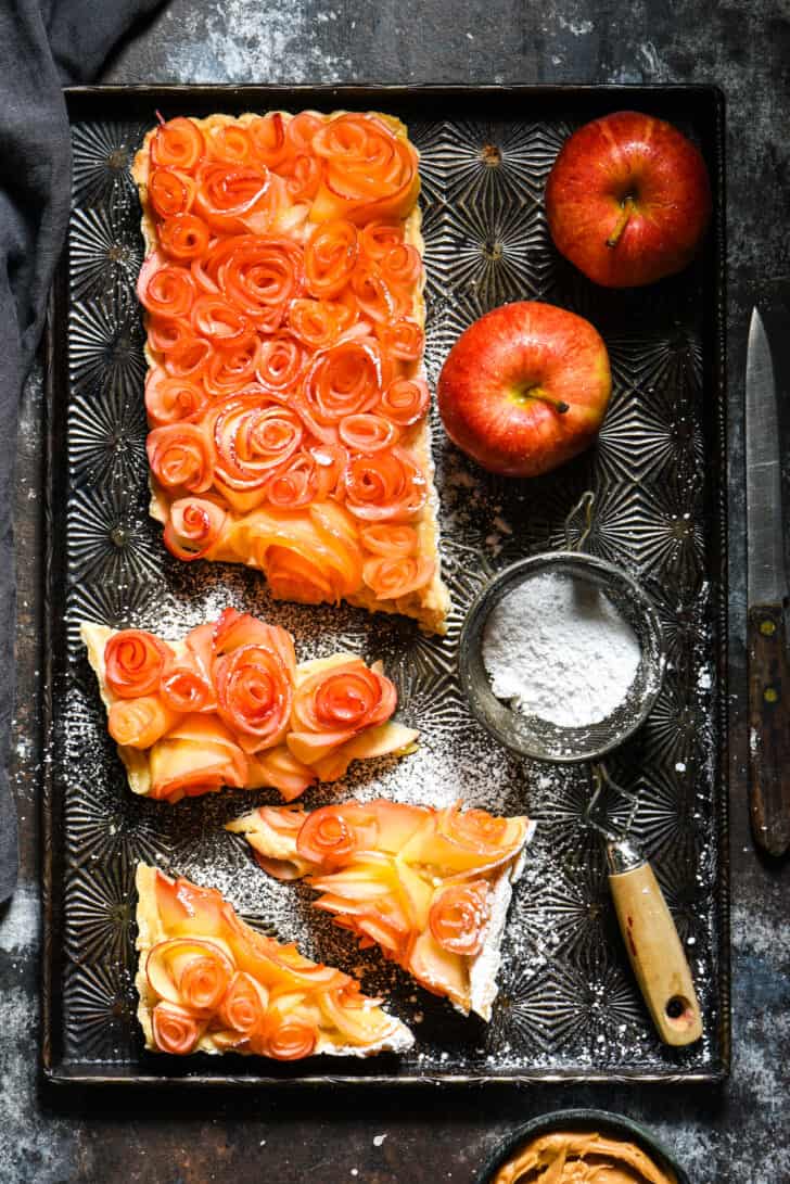 Tart made with peanut butter custard and apple "rose" on vintage baking pan.