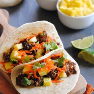 Asian Short Rib Tacos with Pineapple and Crunchy Slaw - a tasty meal where your slow cooker does all the work! | foxeslovelemons.com