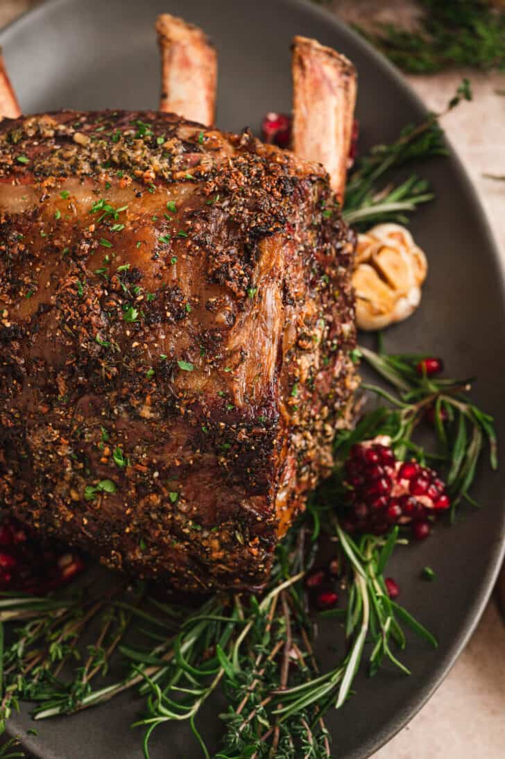 Closeup on a standing rib roast covered in prime rib dry rub.