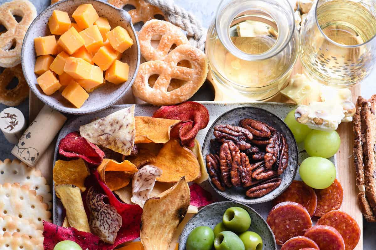 Making a cheese board for wine tasting? Follow this simple, down-to-earth guide to start pairing cheese, charcuterie and other snacks with wine! | foxeslovelemons.com