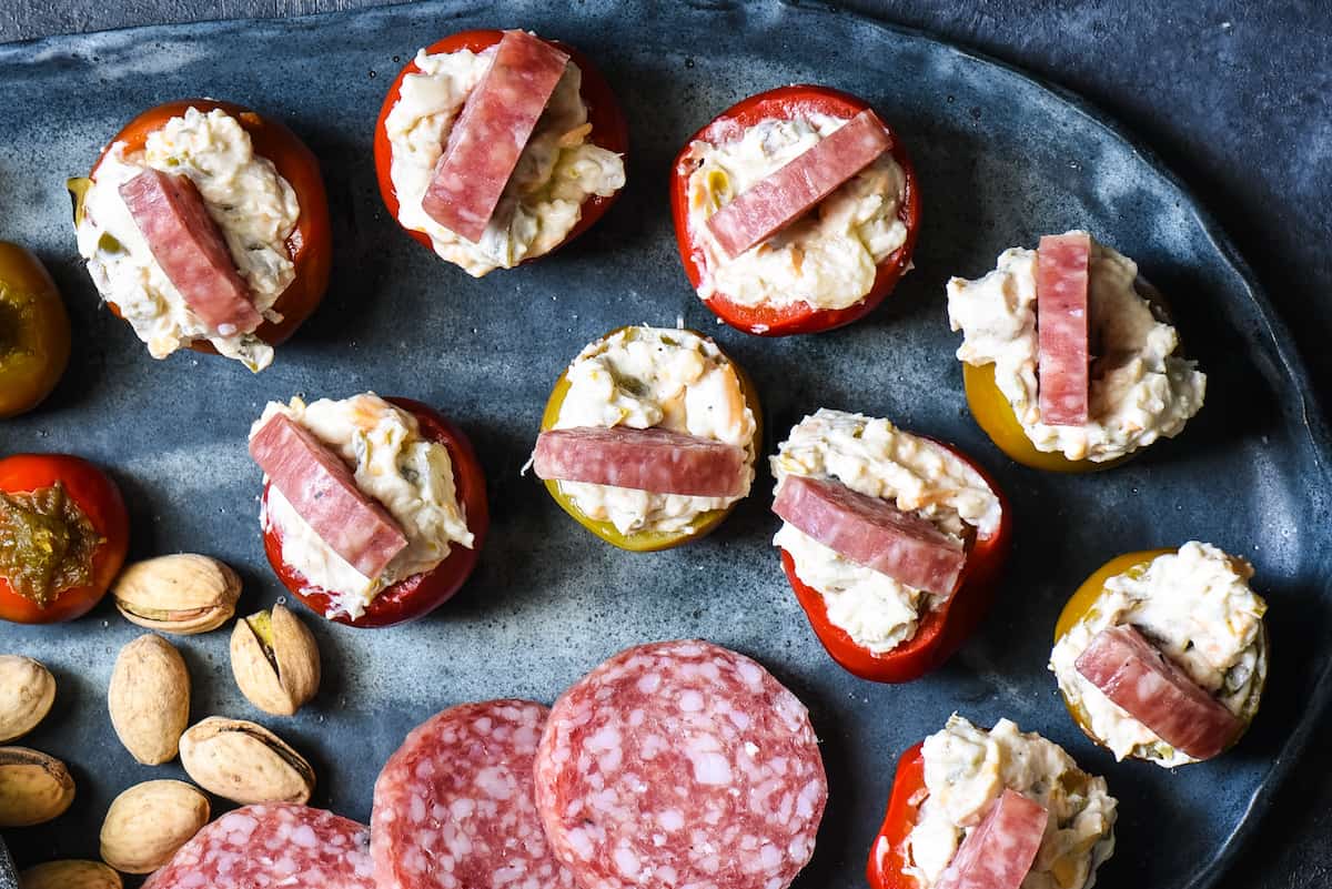 These Cherry Pepper Appetizers are the quickest snack to whip up for a party! No cooking required, but big, satisfying flavors that will keep people happy until the main course. | foxeslovelemons.com