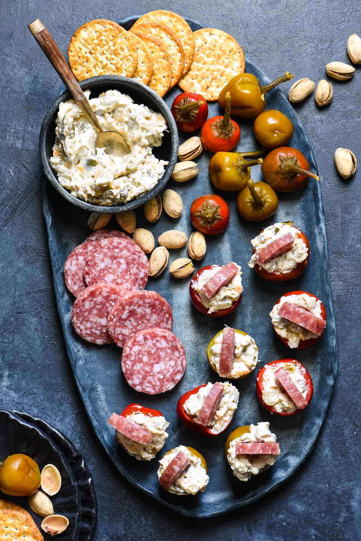 These Cherry Pepper Appetizers are the quickest snack to whip up for a party! No cooking required, but big, satisfying flavors that will keep people happy until the main course. | foxeslovelemons.com