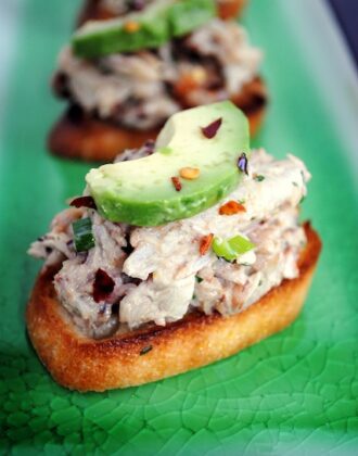 Crabby Snacks - Crunchy crostini topped with cold crab salad and creamy avocado. Inspired by "Silver Linings Playbook." | foxeslovelemons.com