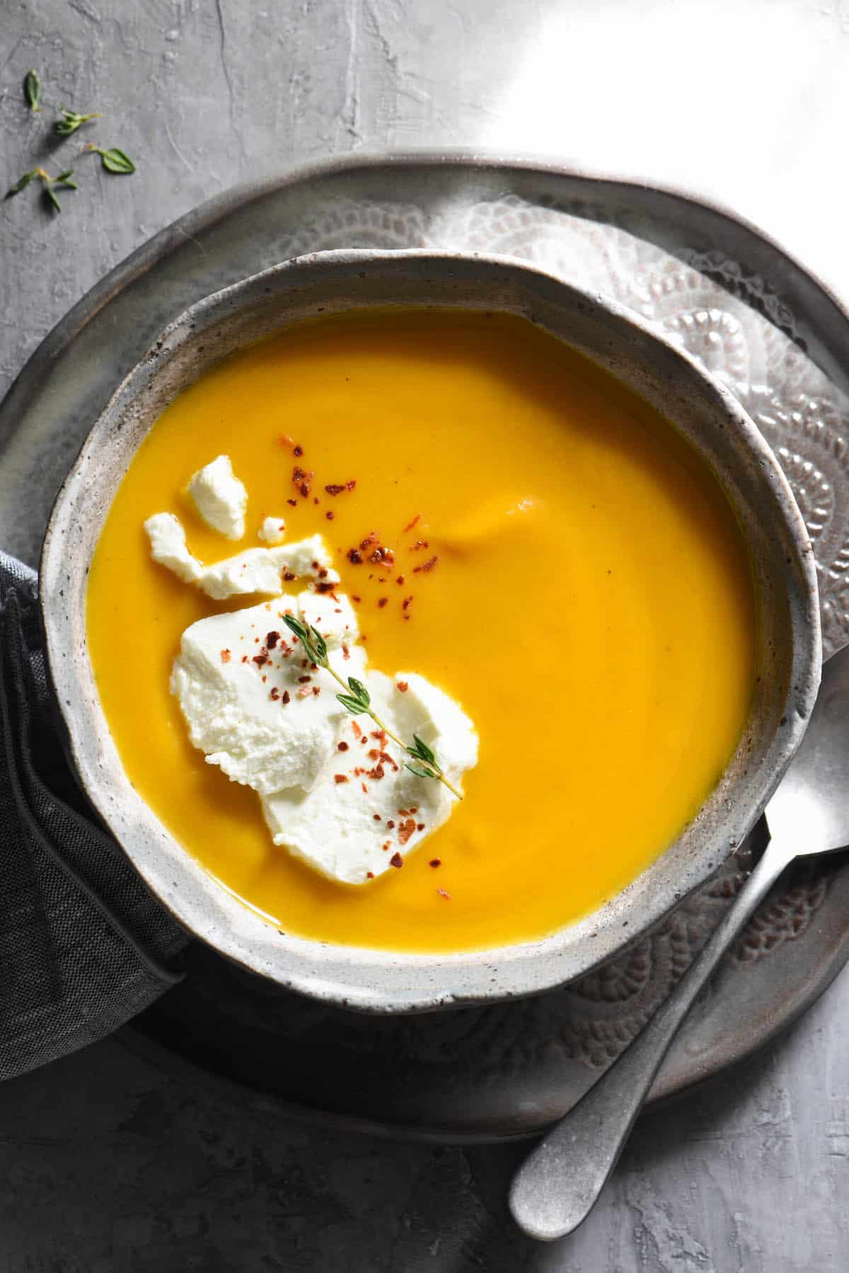 This simple Instant Pot Butternut Squash Soup cooks in just 6 minutes! Finishing with goat cheese adds a special touch that makes this a restaurant-quality dish you can easily make at home. | foxeslovelemons.com