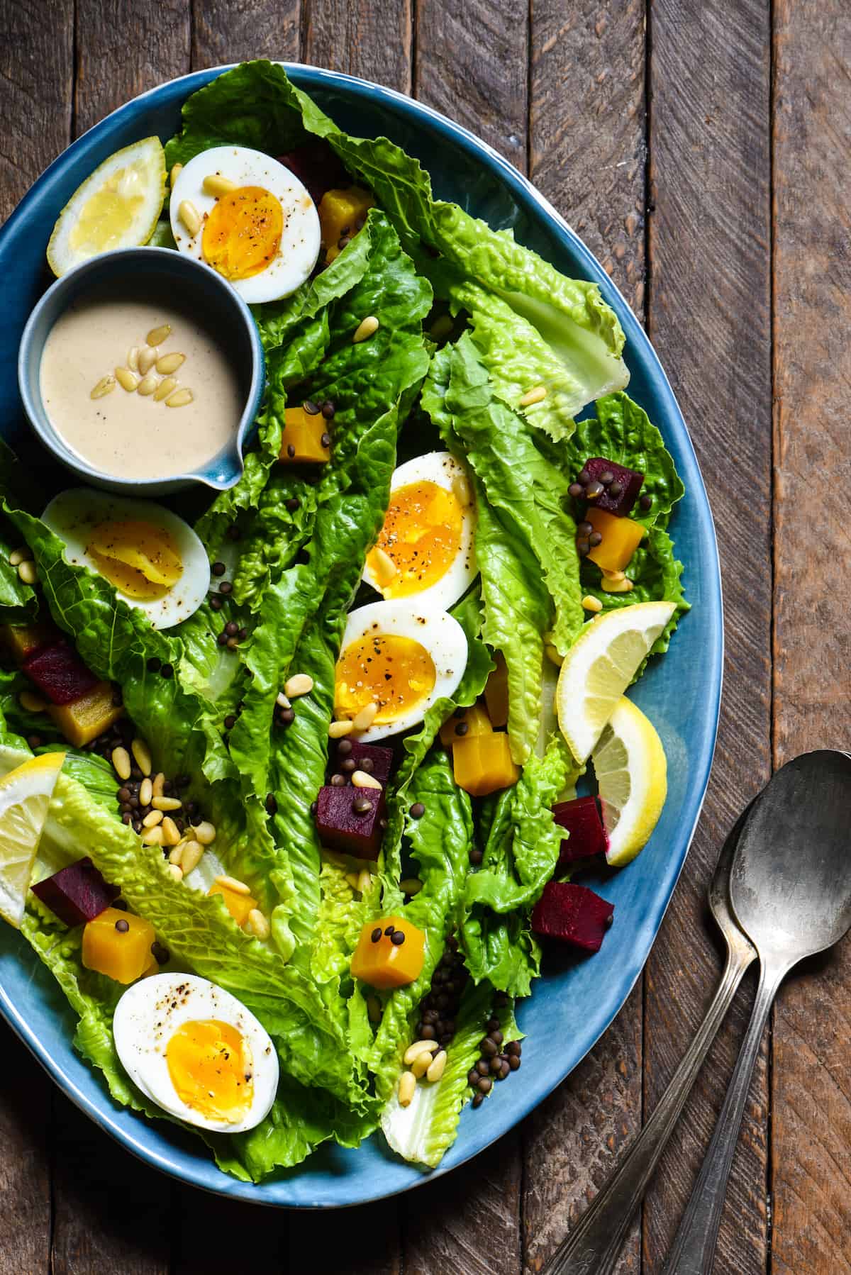 This Lentil & Roasted Beet Salad is a big plate of goodness that is hearty enough to be a complete meal. Serve with easy homemade Maple-Tahini Dressing. | foxeslovelemons.com