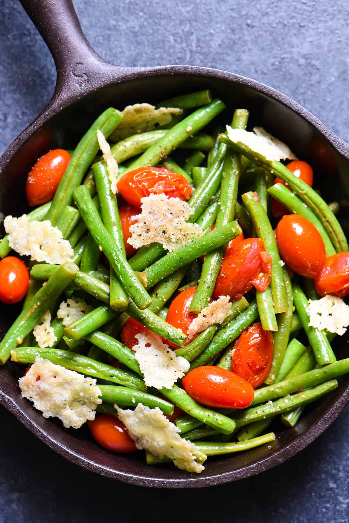 Sautéed Green Beans with Tomatoes & Crispy Parmesan - A simple but fancy-looking side dish for any special meal. | foxeslovelemons.com