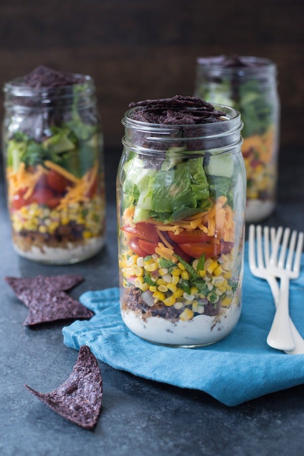 Taco Salad Jars with Green Chile Yogurt Dressing - Classic taco salad, kicked up a notch with a fresh corn salsa + a creamy yogurt dressing. Prep on Sunday, eat for lunches all week! | foxeslovelemons.com