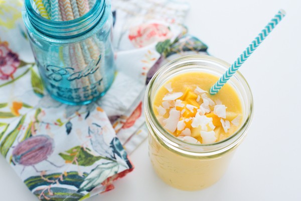 Tropical Sun Smoothie - Wake up your taste buds with this quick and healthful blender breakfast - a combination of pineapple, mango, banana, coconut and vanilla yogurt. | foxeslovelemons.com